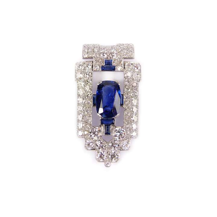 Art Deco sapphire and diamond clip brooch of geometric shield shape centred by a principal cushion cut 3.71ct Burma sapphire,